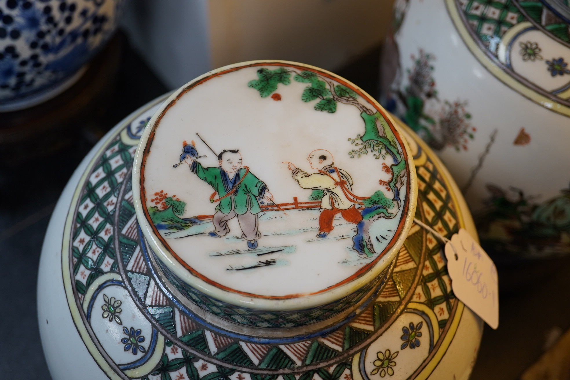 A pair of large Chinese famille verte globular jars and covers, early 20th century